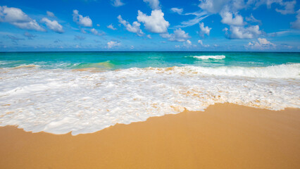 Exotic idyllic white sand sea wave beach blue sky with cloud