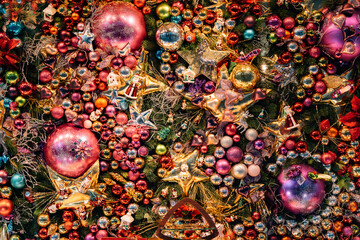 Christmas balls background, many baubles in pink and gold colors