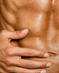 Naklejka premium Fitness, diet and healthy lifestyle. Young handsome man.