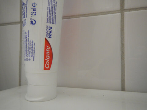 Colgate tooth paste bottle.