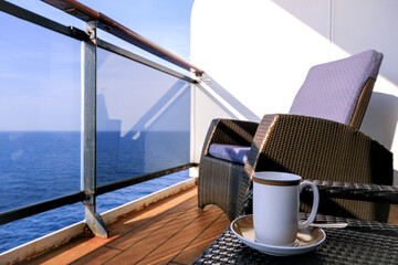 Modern balcony deck chairs sun loungers with table on balcony patio terrace veranda stateroom cabin...