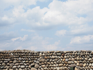 grey stone wall and sky background