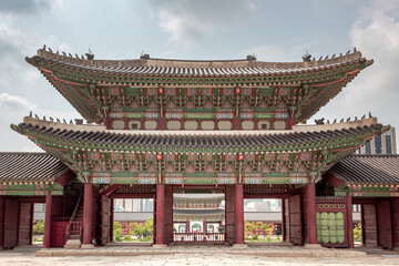 Colorful traditional wood Korean architecture temple gate main entrance at Gyeongbokgung Palace in Seoul South Korea