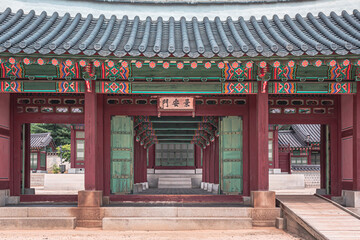 Colorful traditional wood Korean architecture temple building main entrance gate Gyeongbokgung Palace in Seoul South Korea