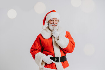 Santa Claus portrait, Christmas and new year's eve festive days concepts - December festive holidays, senior man with beard wearing Santa's costume