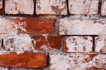 Antique brickwork close-up. Red and white bricks