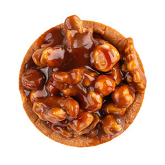 Isolated nougat and hazelnuts tartlet on the white