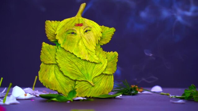 ganesh ji made with green leaves concept design. Ganesha developed by leaf it's shows nature friendly concept