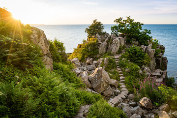 sun shining at the R&oslash;verborgen at the coast of baltic sea on bornholm denmark