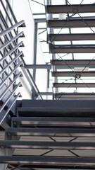 Modern interior staircase. Metal construction. 