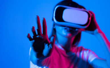 Close up of woman engineer, architector in vr headset working with engineering project in studio.