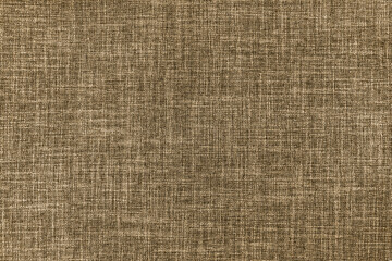 Fototapeta na wymiar Texture of natural brown upholstery fabric or cloth. Fabric texture of natural cotton or linen textile material. Brown canvas background. Decorative fabric for curtain, furniture, walls, clothes