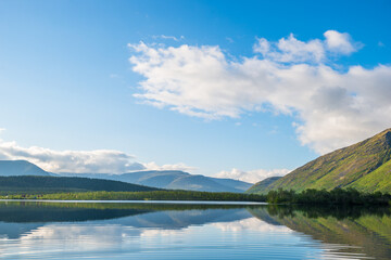 Fototapeta na wymiar Panoramic view of the lake in the mountains