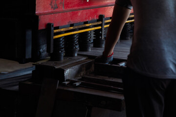 Fototapeta na wymiar Closeup of Industrial Mild Steel Plate Cutting Hydraulic Machine