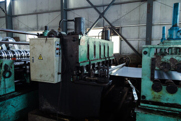Machine for cutting cold rolled steel coils