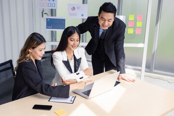 Group of young business people working together in modern office, Business colleague discussing looking and doing video conference on computer