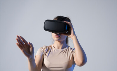 Interior Designer woman Using a VR Software and VR headset to Design a project of new home.