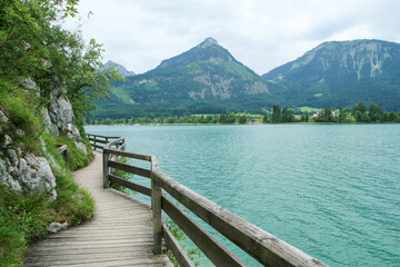 The glacier lake in Austria in the Alps during the rainy and cloudy day. Travel destination for the tourists. 