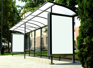 bus shelter with blank poster and advertising billboard sign. background image for mock-up. empty...