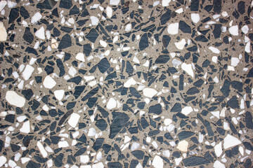 Marble stone terrazzo black and white. Ancient terrazzo stone, marble mosaic.Marble stone black and white. The slab is stone.