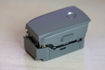 Disassembled drone battery, swollen battery, repair and maintenance of Li-ion power supply for quadrocopter