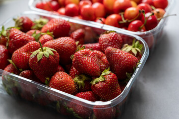 Ripe strawberries and sweet cherries