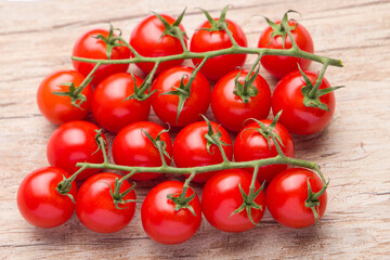 
Cherry tomatoes lying on the table, top view.