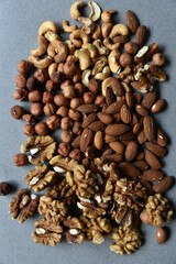 Various delicious nuts on the playground. Nut mixture as a delicious breakfast.