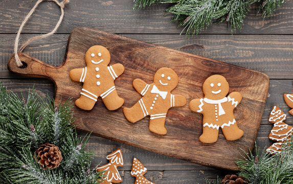 Homemade christmas gingerbread cookies on wooden table.