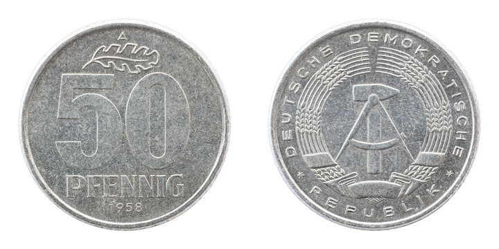 Old inactive coin 50 fifty pfennig 1958 Germany DDR closeup isolated on white background.