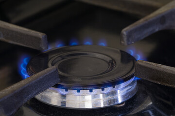 A natural gas burner with small flames.