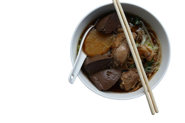 Duck noodles in the bowl with spoon and chopsticks with copy space delicious food for Thai people isolated on white background closeup.
