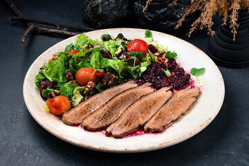 duck fillet with fresh vegetable salad