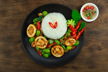 Stir Fried Squids with Stink Bean and Shrimp Paste Spicy dish Served Rice