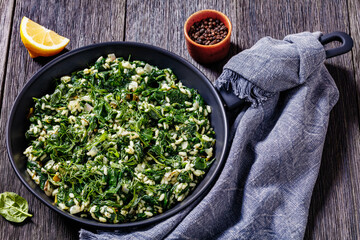 Spanakorizo, Greek spinach and rice pilaf in pan