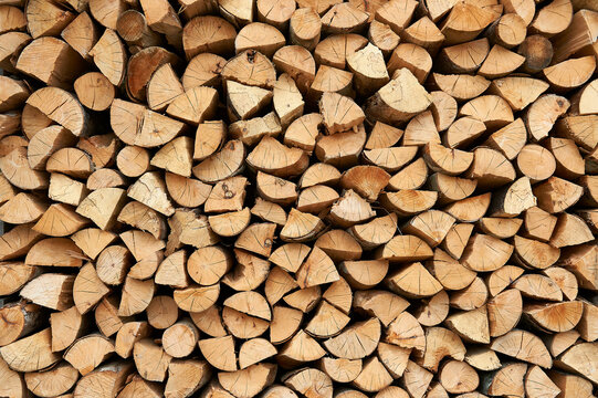 wooden cabin with logs, blocks and wooden plugs for the home fire