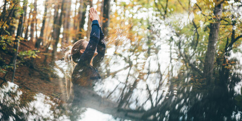 Pretty tranquil woman with ponytail in blue contemporary tracksuit meditates doing namaste mudra...