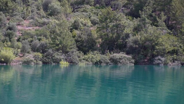 Panorama of the green canyon in Turkey with its clear turquoise water.