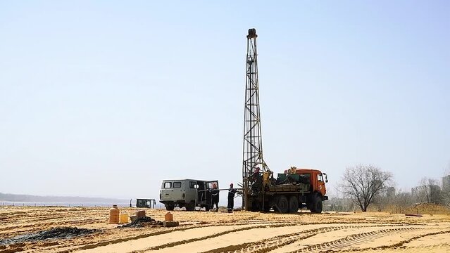 Workers are drilling a well for groundwater