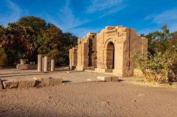 Fototapeta na wymiar Gate of Diocletian and the ruins of the Temple of Augustus in the northern end of the Temple of Isis on Agilkia Island, Egypt.