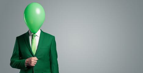 Anonymous businessman with a balloon in front of his head