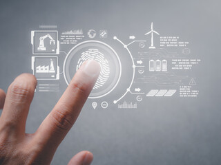 Obraz premium Internet network security concept.Businessman using fingerprint indentification to access personal cloud data.
