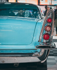 The back of a retro car. Rear light of a vintage car.