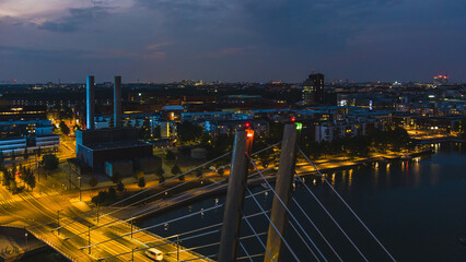 Aerial view of night city. Twilight aerial cityscape