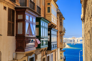 Malta's famous balconies with water view. d
