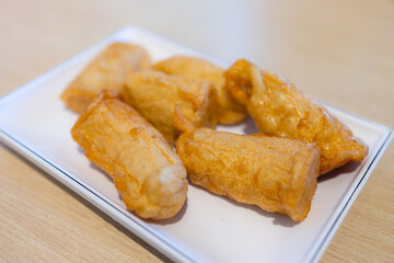 Fry fish roll dish in restaurant