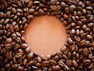 coffee beans. roasted coffee beans on brown background