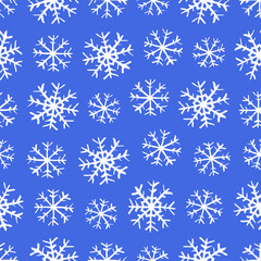 Fototapeta na wymiar Small white ink snowflakes isolated on blue background. Cute monochrome Christmas seamless pattern. Vector simple flat graphic hand drawn illustration. Texture.