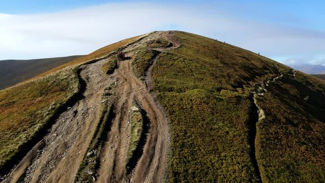 aerial view of trail road to the top of carpathian mountains