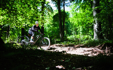 Mountain biker at speed in the forest